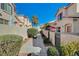 Clean walkway between houses in a residential community at 9567 Belle Reserve St, Las Vegas, NV 89123