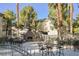 Community patio with fireplace and seating at 10233 King Henry Ave # 203, Las Vegas, NV 89144