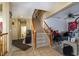 Entryway with staircase, tiled floor, and a pet gate at 10920 Fishers Island St, Las Vegas, NV 89141