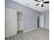 Bedroom boasts a closet, gray walls, and light-colored floors at 11268 Lavandou Dr, Las Vegas, NV 89141