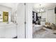 Stylish bathroom with modern vanity and adjacent kitchenette at 1134 Edel Hest Ave, North Las Vegas, NV 89081