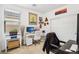 Bright home office features built-in desk and ample wall space at 1134 Edel Hest Ave, North Las Vegas, NV 89081