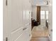 Hallway leading to a bedroom with hardwood floors at 144 Stone Mesa Ct, Henderson, NV 89011