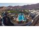 Resort-style pool with palm trees and community amenities at 144 Stone Mesa Ct, Henderson, NV 89011