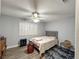 Cozy bedroom with a bed, ceiling fan, and window coverings at 1800 Edmond St # 132, Las Vegas, NV 89146