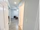 Hallway with doors to bedrooms and bathroom at 1800 Edmond St # 132, Las Vegas, NV 89146