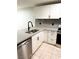 Updated kitchen with white cabinets and stainless steel appliances at 1800 Edmond St # 132, Las Vegas, NV 89146