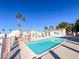 Community pool with surrounding patio area at 1800 Edmond St # 132, Las Vegas, NV 89146