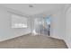 Well-lit bedroom with neutral carpeting and window coverings at 2136 Chertsey Dr # A, Las Vegas, NV 89108