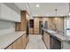 Modern kitchen with light cabinets and large island at 2204 Plaza De La Candela, Las Vegas, NV 89102