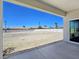Large backyard featuring perimeter fencing, desert landscaping, and plenty of potential at 2280 S Pampa Ave, Pahrump, NV 89048