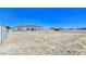 Expansive backyard featuring a modern single-story home and perimeter fencing at 2280 S Pampa Ave, Pahrump, NV 89048