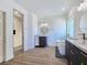 Bright bathroom with double vanity, modern fixtures, a soaking tub and marble shower at 2280 S Pampa Ave, Pahrump, NV 89048
