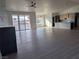 A seamless blend of living, dining, and kitchen spaces is enhanced by a modern fireplace at 2280 S Pampa Ave, Pahrump, NV 89048