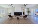 Open living room boasts fireplace, plenty of natural light, and comfortable seating at 2280 S Pampa Ave, Pahrump, NV 89048