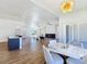 Open-plan living space showcases a dining area, fireplace, and modern design elements at 2280 S Pampa Ave, Pahrump, NV 89048