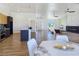 Bright, open living space with a fireplace, and modern furnishings for a welcoming atmosphere at 2280 S Pampa Ave, Pahrump, NV 89048