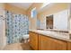 Clean bathroom with shower/tub combo and wood vanity at 2595 Fountain Ave, Pahrump, NV 89048