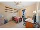 Bedroom with a ceiling fan, closet, and built in shelves at 2595 Fountain Ave, Pahrump, NV 89048