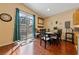 Bright dining area with patio access and hardwood floors at 2595 Fountain Ave, Pahrump, NV 89048