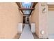 Covered walkway leading to the front door with a pergola at 2595 Fountain Ave, Pahrump, NV 89048