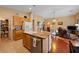 Kitchen with island, stainless steel appliances, and wood cabinets at 2595 Fountain Ave, Pahrump, NV 89048