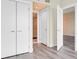 Hallway with wood floors leads to rooms and doors, including a view of the bathroom at 2700 Las Vegas Blvd # 3105, Las Vegas, NV 89109