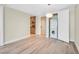 Open floor plan showcasing hardwood floors with washer/dryer and kitchen access at 2700 Las Vegas Blvd # 3105, Las Vegas, NV 89109