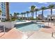 Luxury resort-style pool and spa surrounded by lush landscaping and palm trees at 2700 Las Vegas Blvd # 3105, Las Vegas, NV 89109