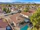 Aerial view of neighborhood homes featuring backyard pool and patio at 3324 Canyon Lake Dr, Las Vegas, NV 89117