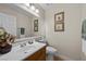 Bathroom with a large mirror and decorative accents at 3324 Canyon Lake Dr, Las Vegas, NV 89117