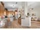 Bright, modern kitchen with stainless steel appliances and an adjacent living space at 3324 Canyon Lake Dr, Las Vegas, NV 89117