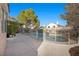 Private backyard pool with covered patio and desert landscaping at 3324 Canyon Lake Dr, Las Vegas, NV 89117