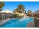 Private backyard pool with custom rock waterfall feature at 3324 Canyon Lake Dr, Las Vegas, NV 89117