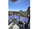 Private balcony with city views and two chairs at 353 E Bonneville Ave # 631, Las Vegas, NV 89101