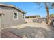 Spacious backyard with gravel and a block wall at 3580 Allegheny Dr, Las Vegas, NV 89122