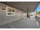 Covered patio with gray flooring and metal railings at 3580 Allegheny Dr, Las Vegas, NV 89122