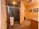 Bathroom with shower, toilet and granite vanity at 3580 W Moberly Ave, Las Vegas, NV 89139