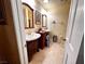 Bathroom with double vanity and tiled floors at 3580 W Moberly Ave, Las Vegas, NV 89139