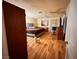 Main bedroom with wood floors and ceiling fan at 3580 W Moberly Ave, Las Vegas, NV 89139