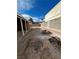 Large backyard with fire pit and covered patio at 3710 Royal Fern Cir, Las Vegas, NV 89115