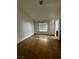 Bright bedroom with tile flooring and window with blinds at 3710 Royal Fern Cir, Las Vegas, NV 89115