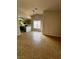 Spacious dining area with tile floor and kitchen view at 3710 Royal Fern Cir, Las Vegas, NV 89115