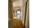 Bright hallway with tile flooring and view into dining area at 3710 Royal Fern Cir, Las Vegas, NV 89115