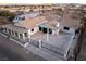 Aerial showcases fenced property with a unique color scheme, columns, and a long, low-slung roof at 3759 Glen Ave, Las Vegas, NV 89121