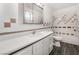 Bathroom with tiled shower, vanity, and toilet at 3759 Glen Ave, Las Vegas, NV 89121