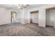 Bright bedroom featuring a ceiling fan and large closet at 3759 Glen Ave, Las Vegas, NV 89121