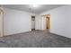 Simple bedroom with grey carpet and a closet at 3759 Glen Ave, Las Vegas, NV 89121