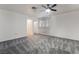 Well-lit bedroom with ceiling fan and carpet flooring at 3759 Glen Ave, Las Vegas, NV 89121