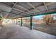 Spacious covered patio with concrete flooring and teal accents at 3759 Glen Ave, Las Vegas, NV 89121